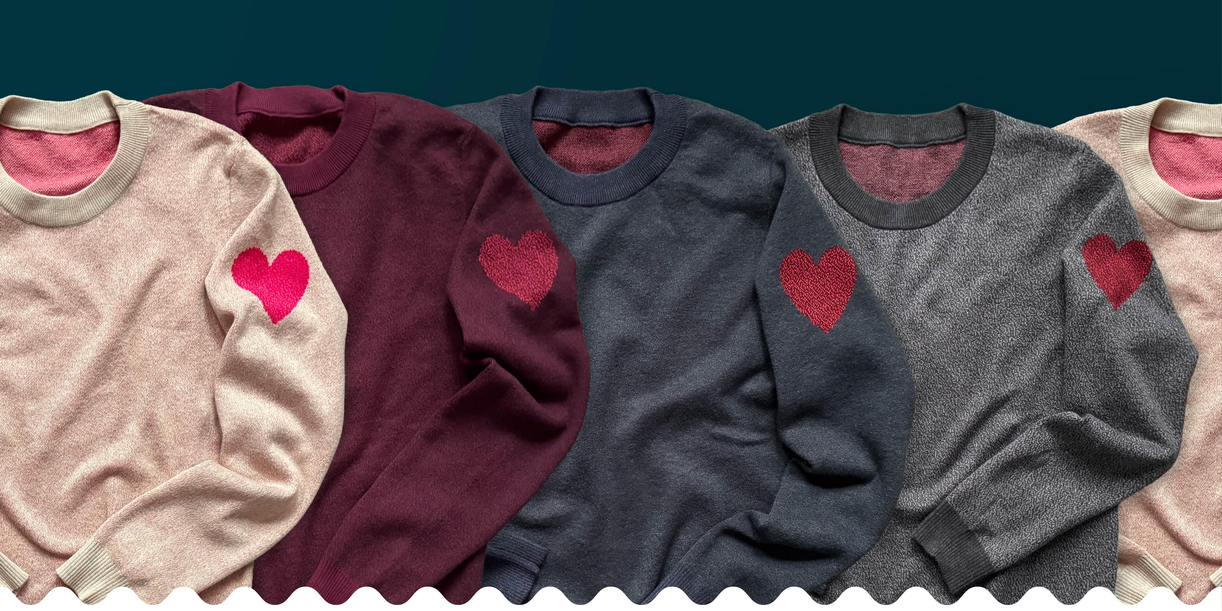 Colorful artist-designed graphic knit sweaters with hearts on the sleeves by Jedd — fashion that spreads the love