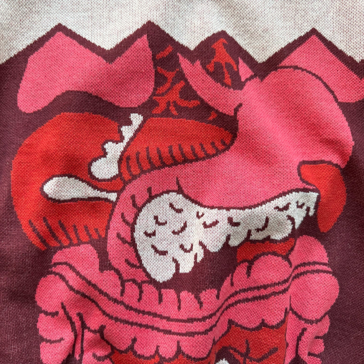 Close-up detail of the knitted guts design on the I Love Your Guts sweater by Jedd — distinctive jacquard knitwear