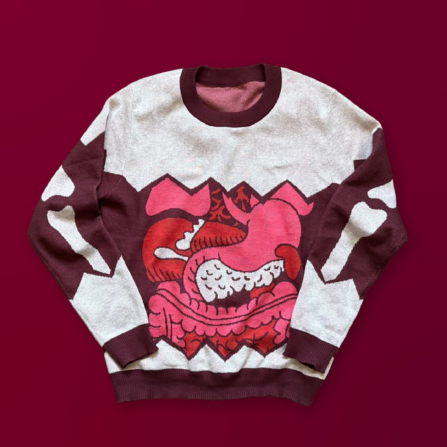 I Love Your Guts graphic knit sweater — artist-designed anatomical heart knitwear by Jedd, standout designer fashion