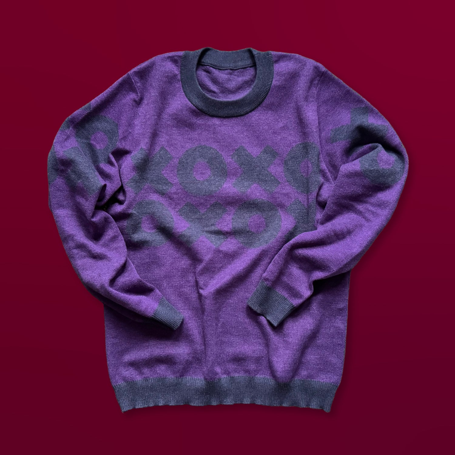 XOXO graphic knit sweater in deep purple — original designer knitwear with hugs and kisses motif by Jedd