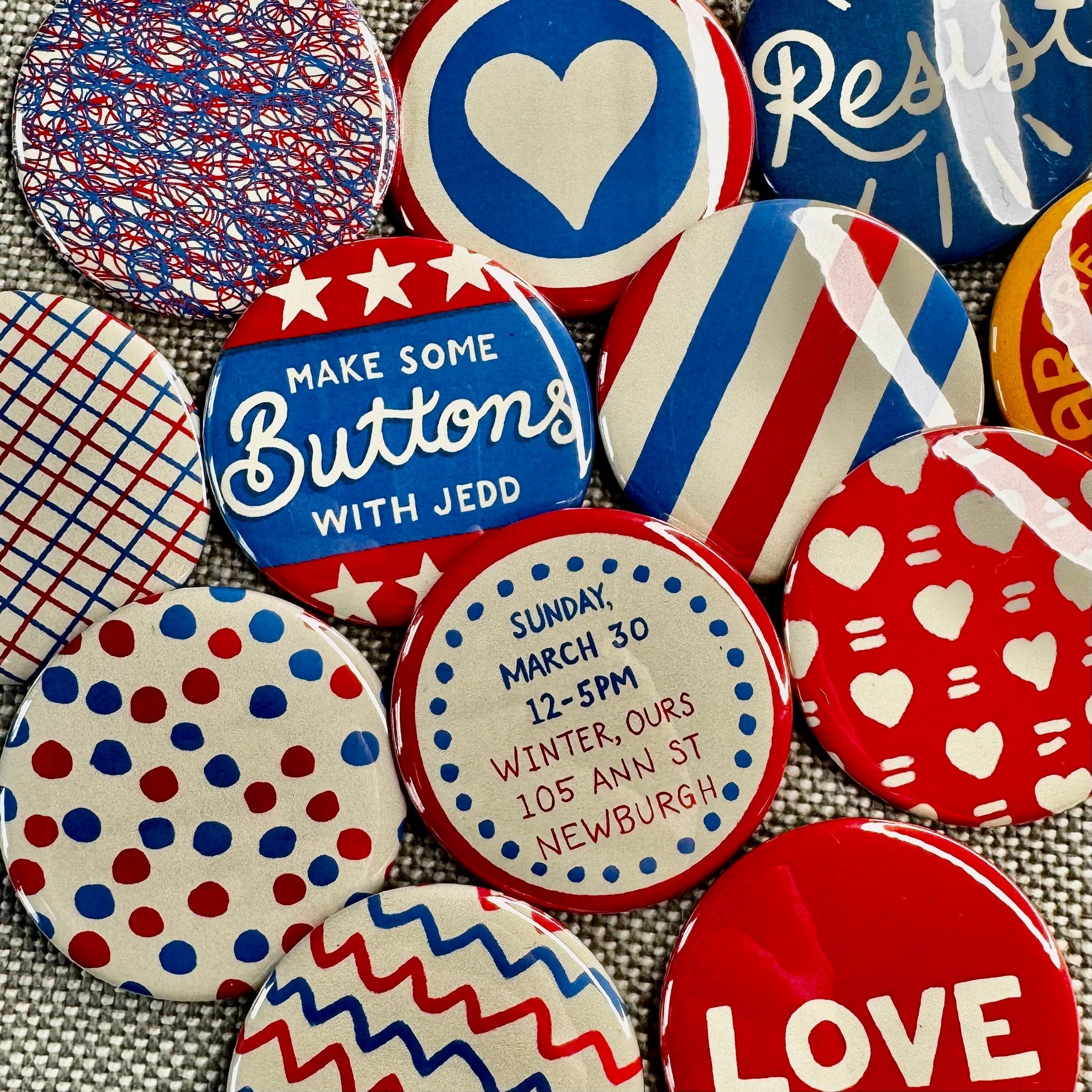 A stack of buttons with one reading "Make buttons with Jedd"
