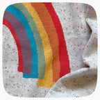 Detail of a knitted rainbow pattern.