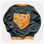 The back of a green graphic knit sweater with a big piece of cheese design on the center.