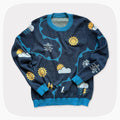 A blue graphic knit sweater with weather forecast shapes like the sunny, clouds, and snowflakes.
