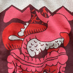Close-up detail of the knitted guts design on the I Love Your Guts sweater by Jedd — distinctive jacquard knitwear