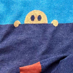 Hey Neighbor graphic knit sweater detail — cozy neighborhood knit design, artist-made fashion by Jedd