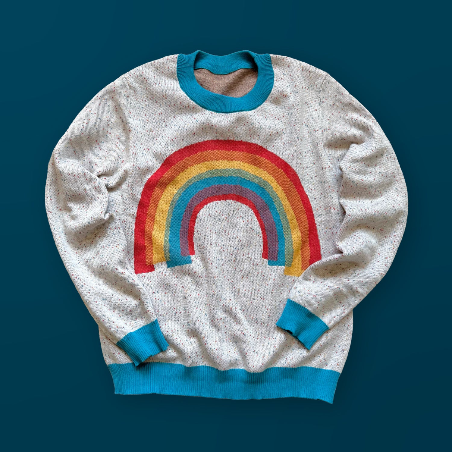 Over the Rainbow graphic knit sweater — artist-designed colorful rainbow knitwear by Jedd, vibrant designer fashion