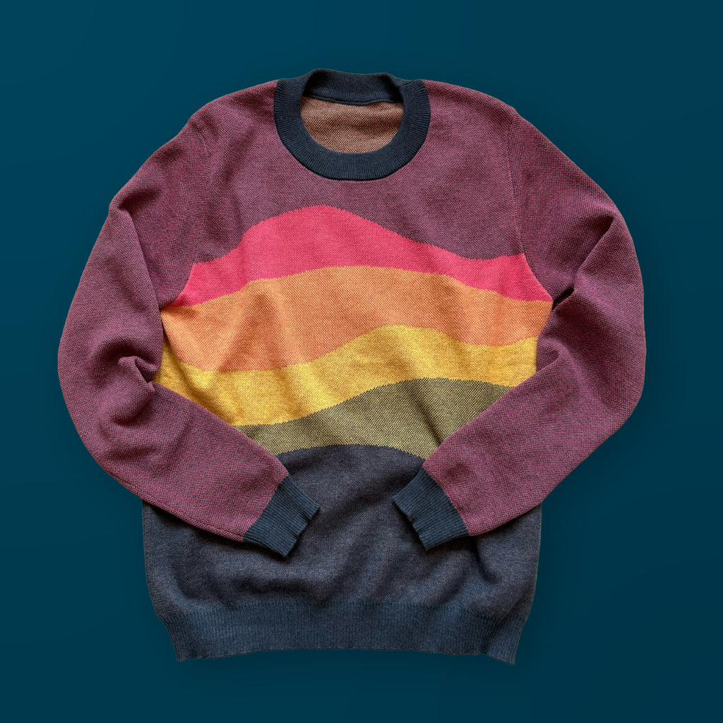 Horizons graphic knit sweater in sunset colorway — layered colorful horizon design by artist Jedd, designer knitwear