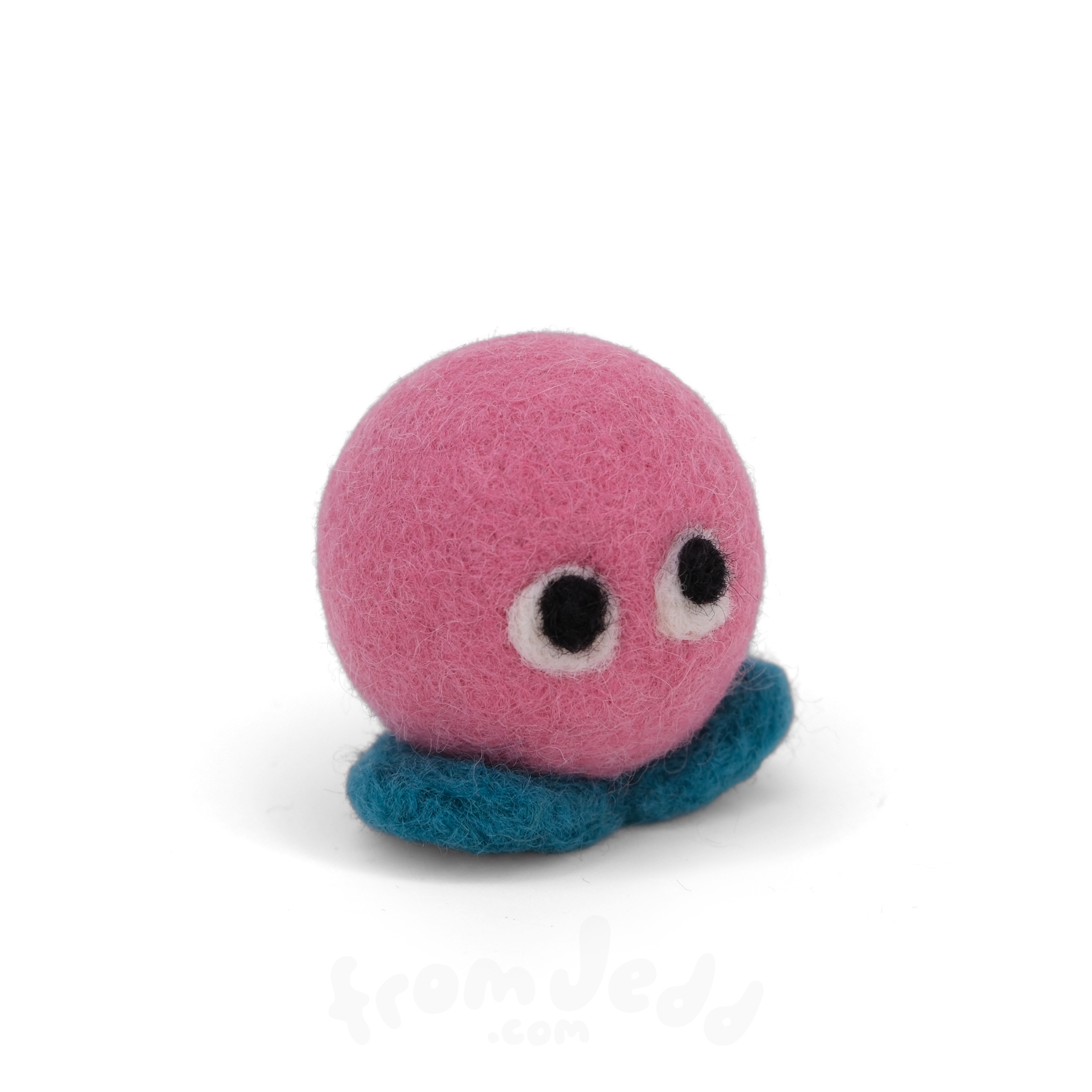 A pink felt creature with two eyes and teal feet.