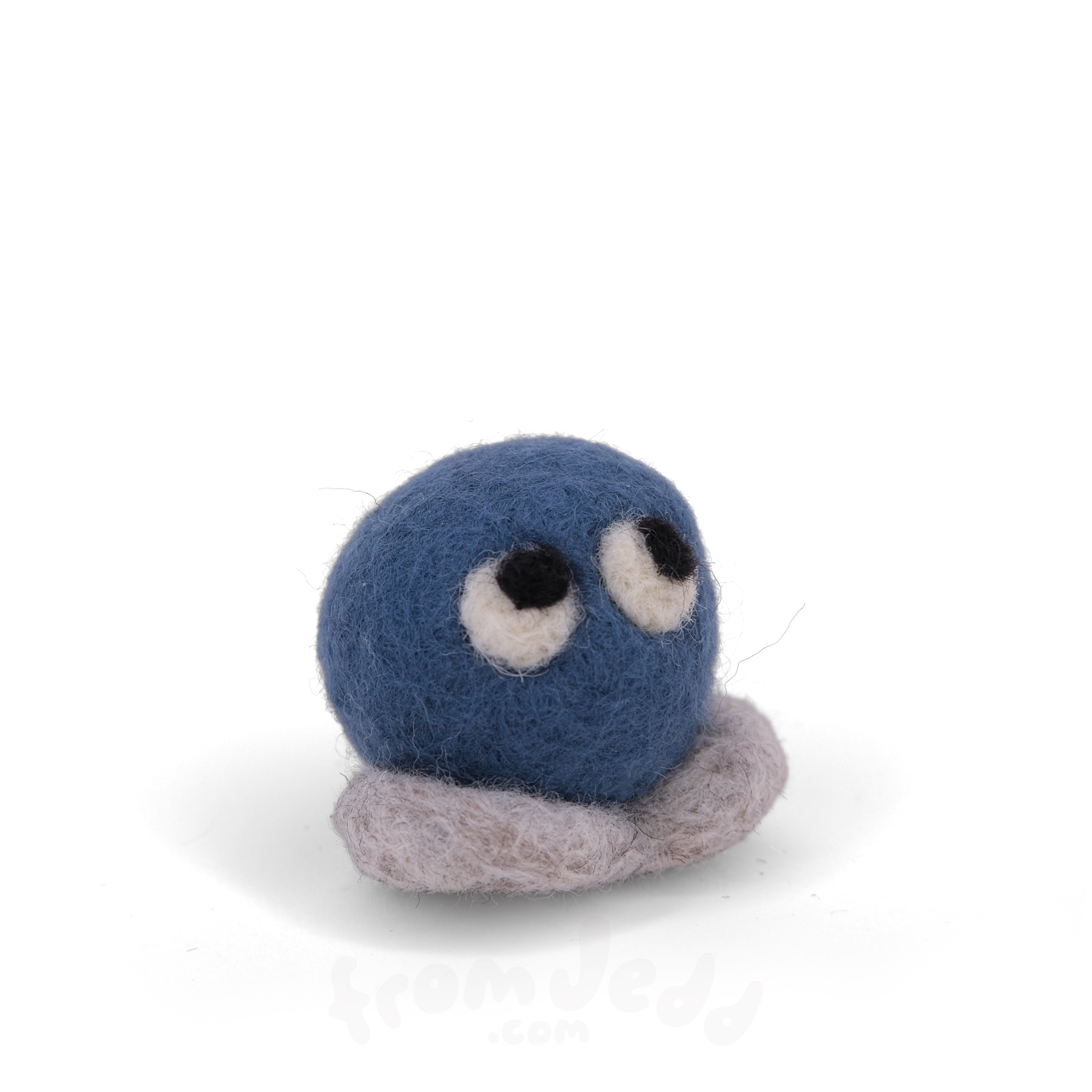 A blue felted creature with eyes looking up and grey feet.