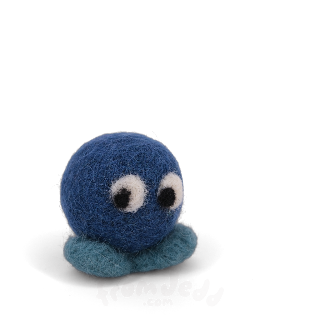 A blue felted creature with big eyes and teal feet.